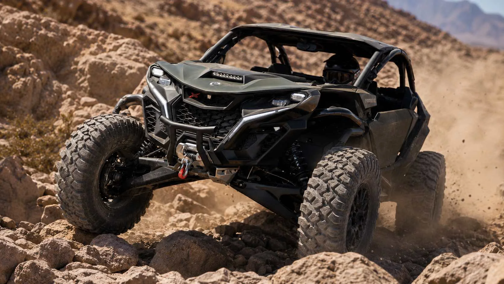 Can-Am Maverick R X rc 2026 en action sur une piste rocheuse